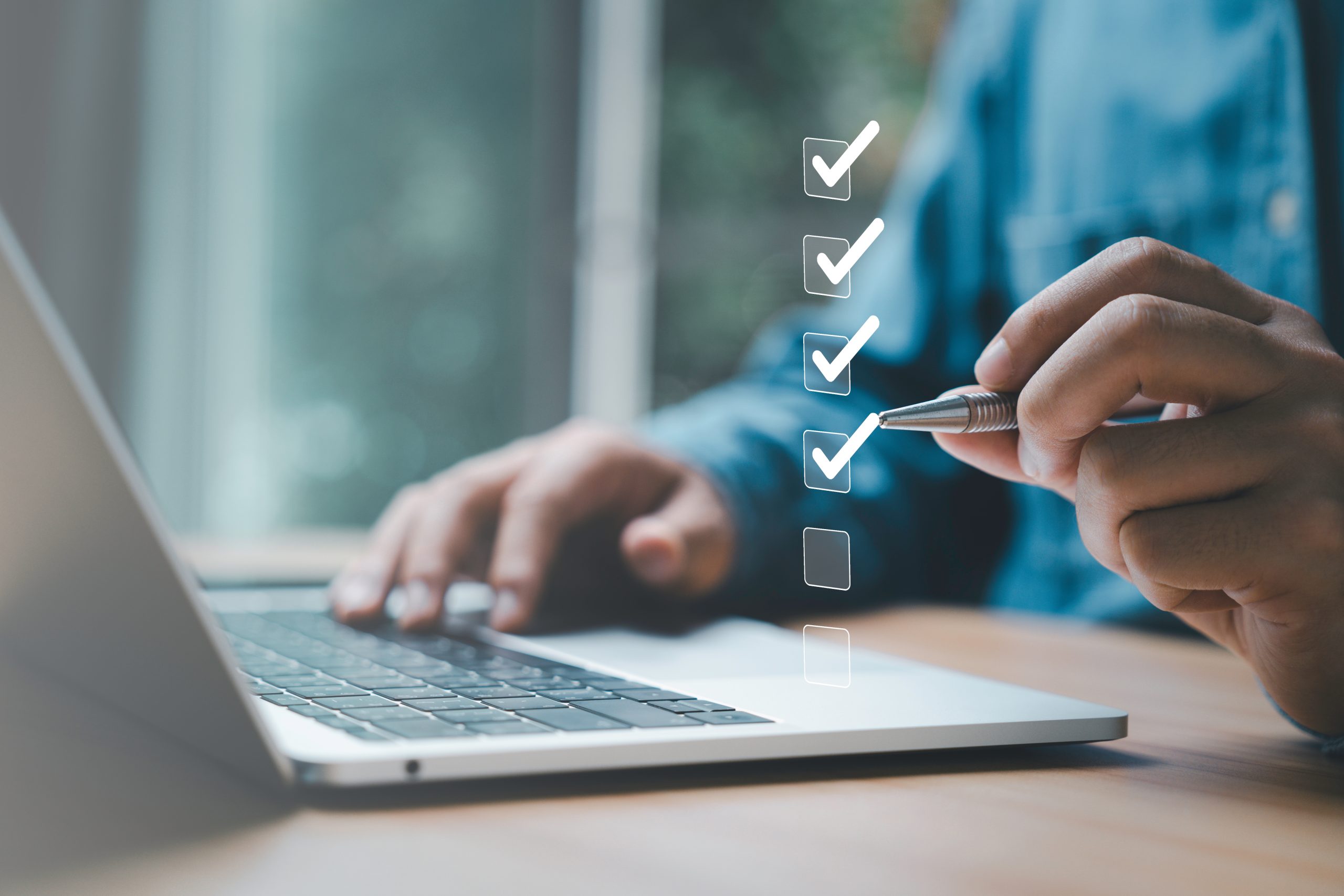 Businessman use pen to tick correct sign mark in checkbox for qu